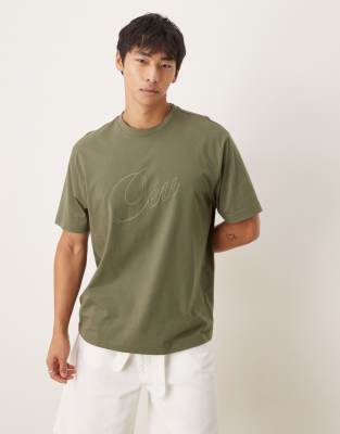 ASOS DESIGN – Kakigrön, avslappnad t-shirt med texttryck - view 1