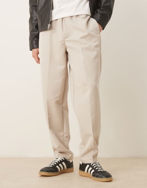 ASOS DESIGN tapered fit smart trousers with elasticated waistband in stone