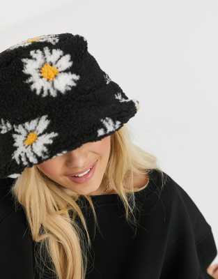 ASOS DESIGN – Kapelusz typu bucket ze sztucznego kożuszka ze wzorem w stokrotki i z wywijanym rondem