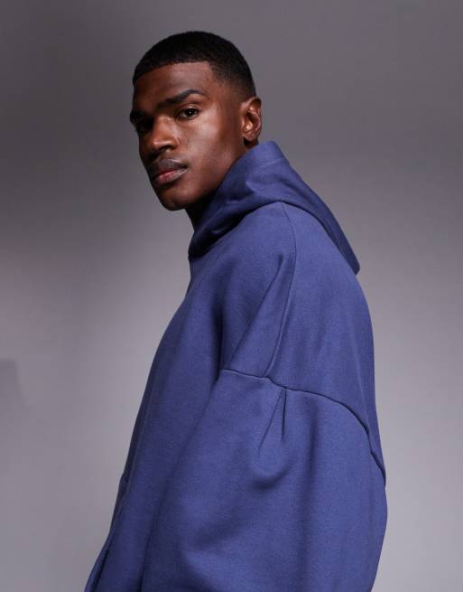 ASOS DESIGN – Kapuzenpullover aus schwerem Material in verwaschenem Marineblau mit extremer Oversize-Passform und Ärmeldetails, 4 von 5
