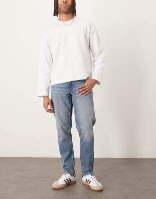Karottenjeans in hellblauer Waschung Blau 48 Long