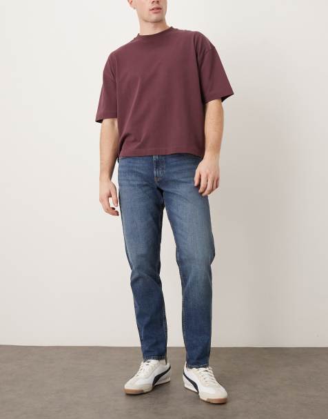 ASOS DESIGN – Karottenjeans in mittelblauer Waschung - view 1