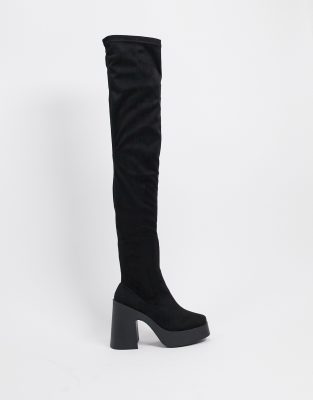 tight over the knee heeled boots