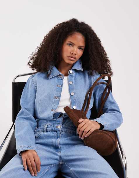 ASOS DESIGN – Kastig geschnittener Jeans-Jumpsuit in Mittelblau - view 1