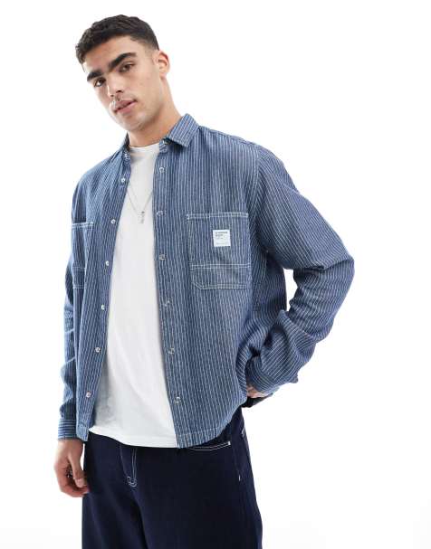 ASOS DESIGN – Kastig geschnittenes Oversize-Jeanshemd in Marineblau gestreift - view 1