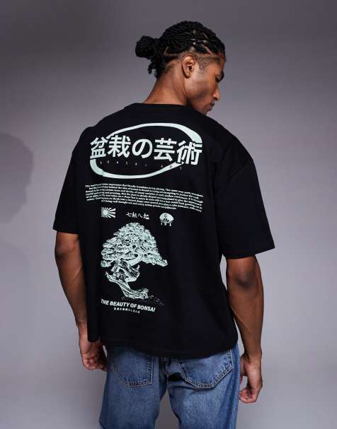 ASOS DESIGN – Kastig geschnittenes Oversize-T-Shirt in Schwarz mit Bonsai-Print - view 1