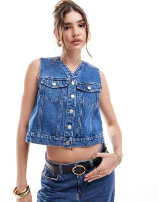 ASOS DESIGN - Kastige Jeansweste im Western-Stil in Mittelblau