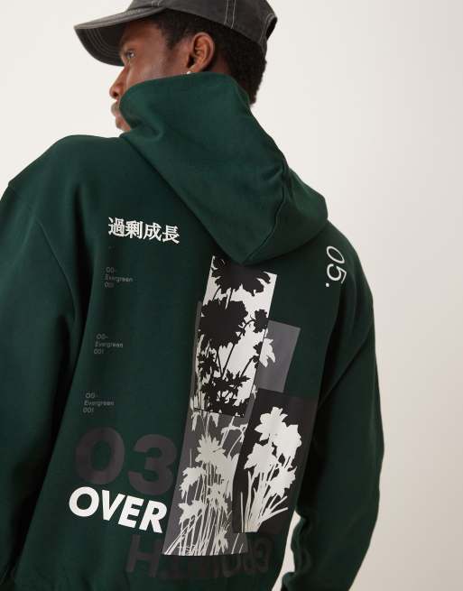 ASOS DESIGN – Kastiger Oversize-Kapuzenpullover in Dunkelgrün mit floralem Rückenprint