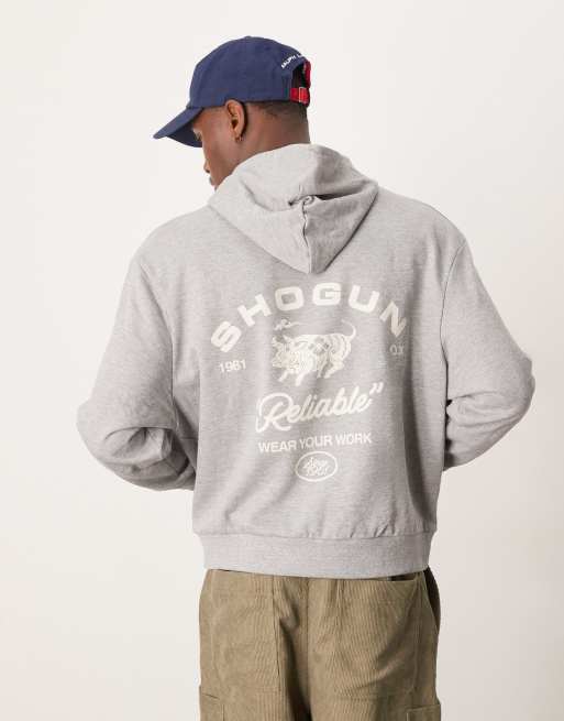 ASOS DESIGN – Kastiger Oversize-Kapuzenpullover in grau meliert mit Grafikprint im amerikanischen Stil