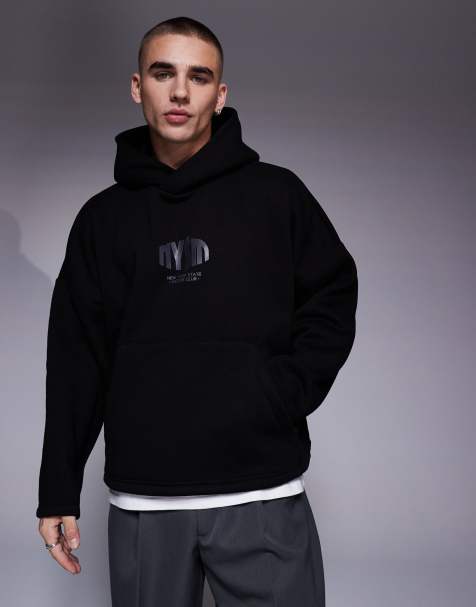 ASOS DESIGN – Kastiger Oversize-Kapuzenpullover in Schwarz mit überschnittenen Schultern im schlichtem Look - view 1
