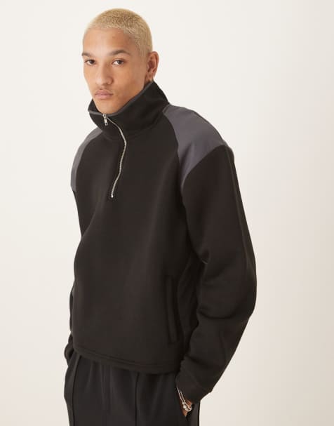 ASOS DESIGN – Kastiger Oversize-Pullover aus Fleece in Schwarz mit kontrastierenden Bahnen aus Nylon - view 1