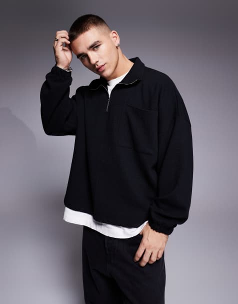 ASOS DESIGN – Kastiges, geripptes Oversize-Sweatshirt aus schwerem Material in Schwarz mit überschnittenen Schultern und halblangem Reißverschluss - view 1