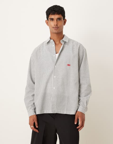 ASOS DESIGN – Kastiges, kariertes Oversize-Hemd in Schwarz mit Bruststickerei - view 1