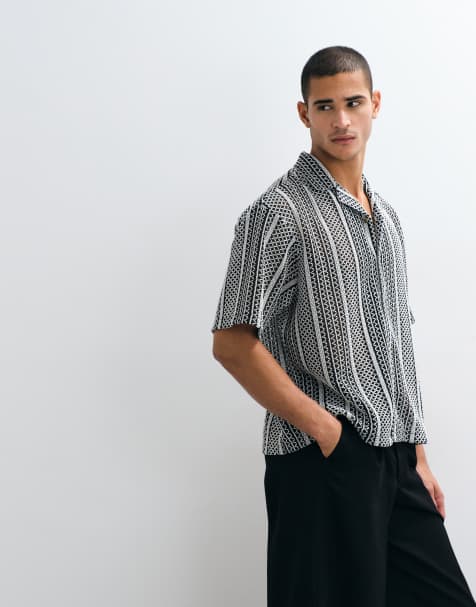 ASOS DESIGN – Kastiges Oversize-Hemd aus Häkelstrick in Schwarz mit Reverskragen - view 1