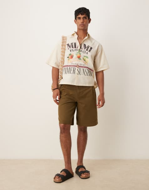 ASOS DESIGN – Kastiges Oversize-Hemd in Ecru mit Aufdruck - view 1