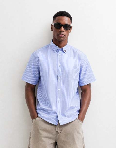 ASOS DESIGN – Kastiges Oversize-Hemd in gestreiftem Blau mit Placement-Print - view 1