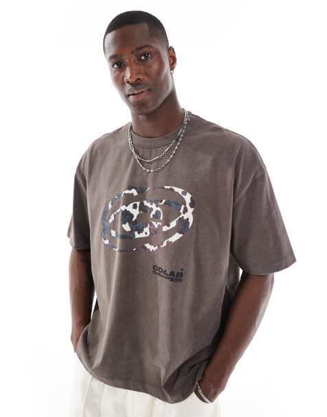 ASOS DESIGN – Kastiges Oversize-T-Shirt aus 220 g/m² schwerem Material in verwaschenem Braun mit Straßen-Print - view 1