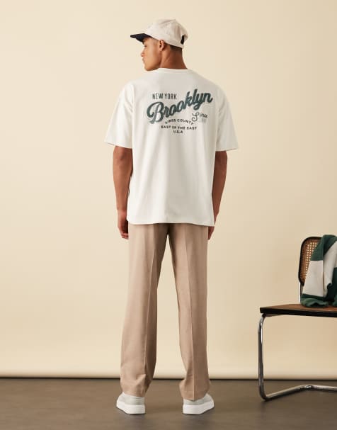 ASOS DESIGN – Kastiges Oversize-T-Shirt aus schwerem Stoff in Wollweiß mit City-Print - view 1