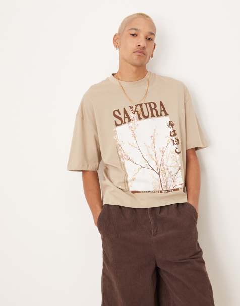 ASOS DESIGN – Kastiges Oversize-T-Shirt in Beige mit Grafikprint vorne - view 1