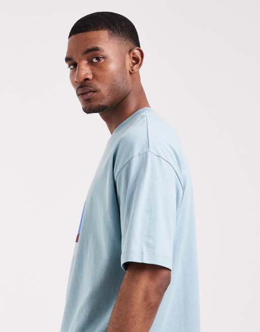 ASOS DESIGN – Kastiges Oversize-T-Shirt in Blau mit Tennis-Grafikprint, 4 von 5