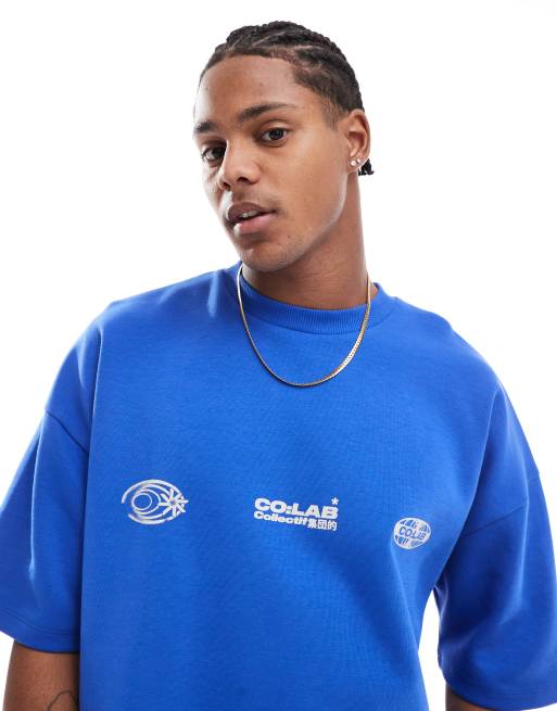 ASOS DESIGN – Kastiges Oversize-T-Shirt in Blau mit überschnittenen Schultern und Grafikprint auf dem Rücken, 300 g/m² schwer