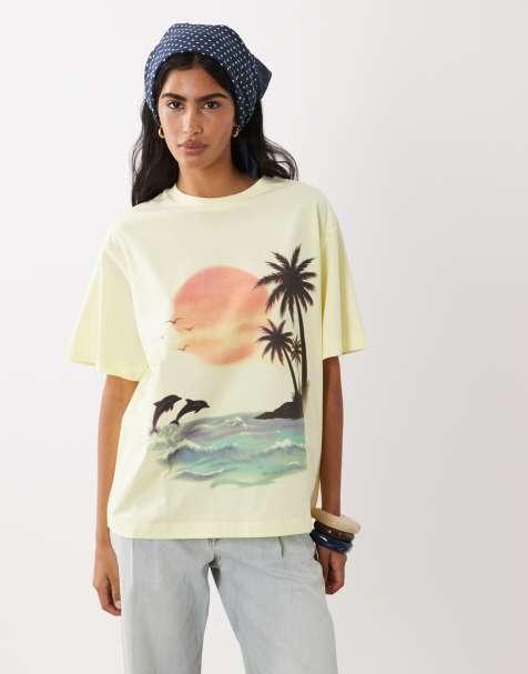 ASOS DESIGN – Kastiges Oversize-T-Shirt in Buttermilchgelb mit Airbrush-Urlaubsgrafik - view 1