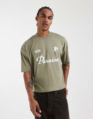 Kastiges Oversize-T-Shirt in Dunkelgrün mit Fußball-Print Grün 2XL