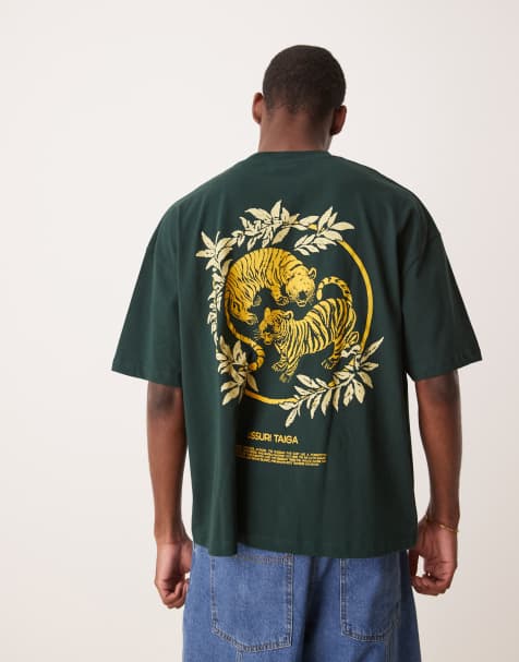 ASOS DESIGN – Kastiges Oversize-T-Shirt in Dunkelgrün mit Souvenir-Print - view 1