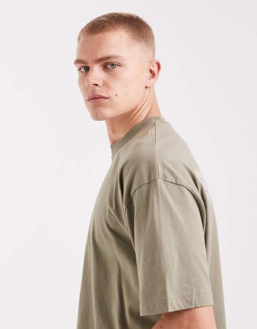 ASOS DESIGN – Kastiges Oversize-T-Shirt in Grün meliert mit Bubble-Textprint, 4 von 5