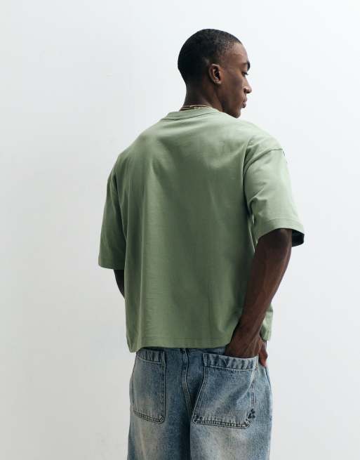 ASOS DESIGN – Kastiges Oversize-T-Shirt in Grün mit Grafik auf der Brust, 5 von 5