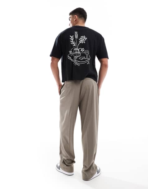 ASOS DESIGN – Kastiges Oversize-T-Shirt in Schwarz mit Blumen-Print - view 1