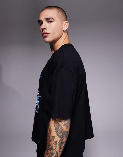 ASOS DESIGN – Kastiges Oversize-T-Shirt in Schwarz mit Blumen-Print, 2 von 5
