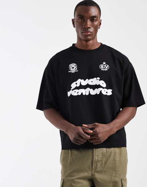 ASOS DESIGN – Kastiges Oversize-T-Shirt in Schwarz mit Fußball-Print in Bubble-Optik - view 1