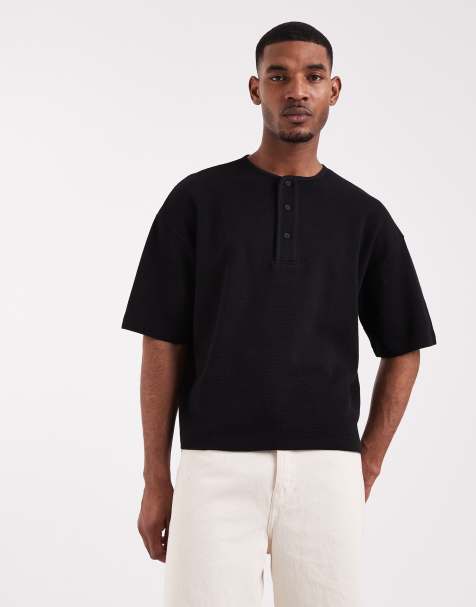 ASOS DESIGN – Kastiges Oversize-T-Shirt in Schwarz mit Henley-Ausschnitt und Waffelstruktur - view 1