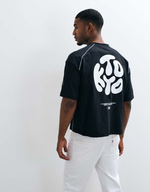 ASOS DESIGN – Kastiges Oversize-T-Shirt in Schwarz mit Kyoto-Print, 4 von 5