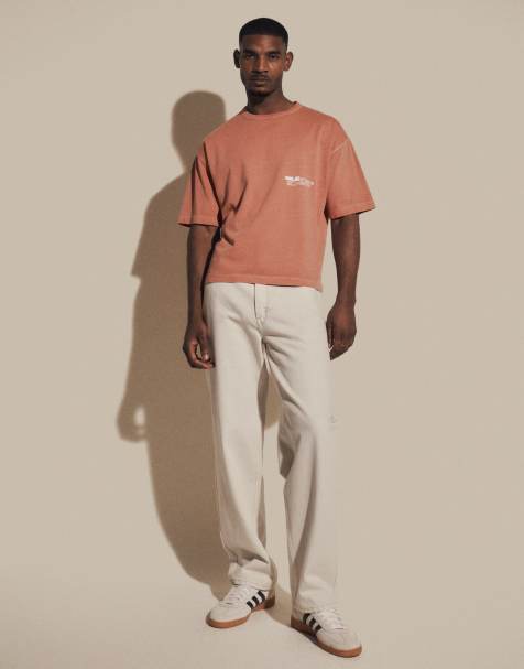 ASOS DESIGN – Kastiges Oversize-T-Shirt in verwaschenem Rosa mit Schriftzug-Grafik - view 1