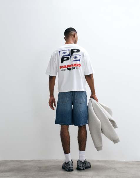 ASOS DESIGN – Kastiges Oversize-T-Shirt in Weiß mit „Paraiso Studio“-Applikation - view 1