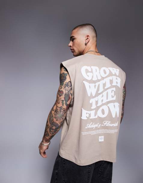 ASOS DESIGN – Kastiges Oversize-Tanktop in Beige mit Text-Grafikprint - view 1