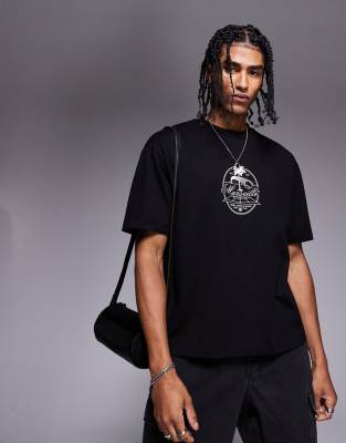 ASOS DESIGN – Kastiges Relaxed-Fit-T-Shirt in Schwarz mit Brust-Print - view 1