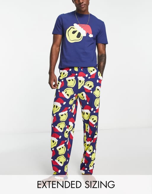 ASOS DESIGN - Kerstmis - Pyjamaset met T-shirt en loungebroek in blauw met Kerstman smiley-print