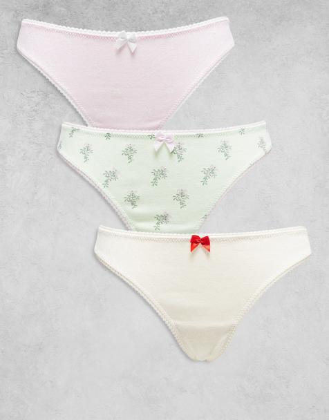 ASOS DESIGN - Kerstmis - Set van 3 ajourgebreide strings met hartjes, maretakken en strikkenprint in groen, crème en roze - view 1