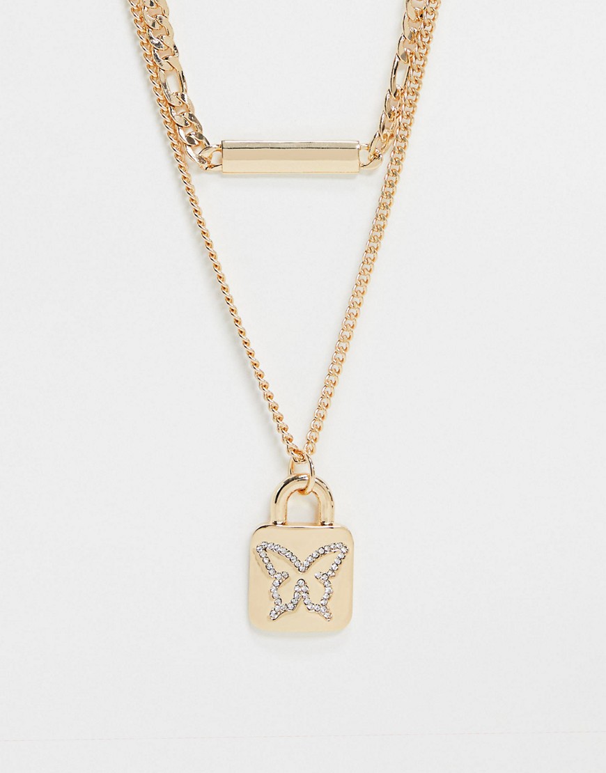 ASOS DESIGN - Ketting met meerdere rijen, kristallen vlinder, slotje en staafje in goud