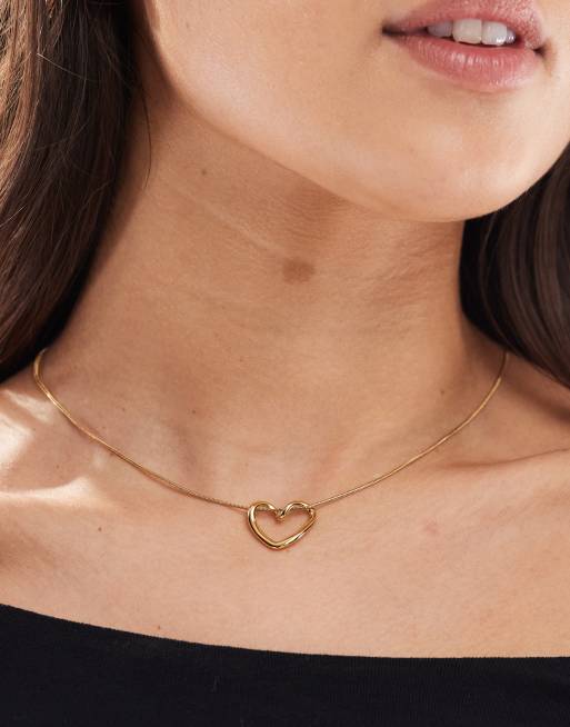 ASOS DESIGN - Ketting van waterbestendige roestvrij staal met hartvormig hangertje in goudkleur, met cadeauzakje