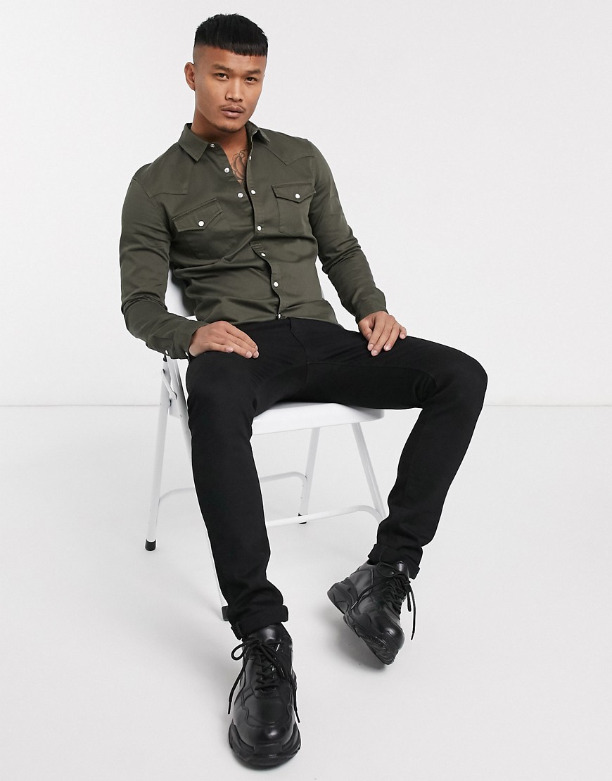ASOS DESIGN – Khakifärgad extra smal jeansskjorta i cowboystil, ekologiskt material-Blå
