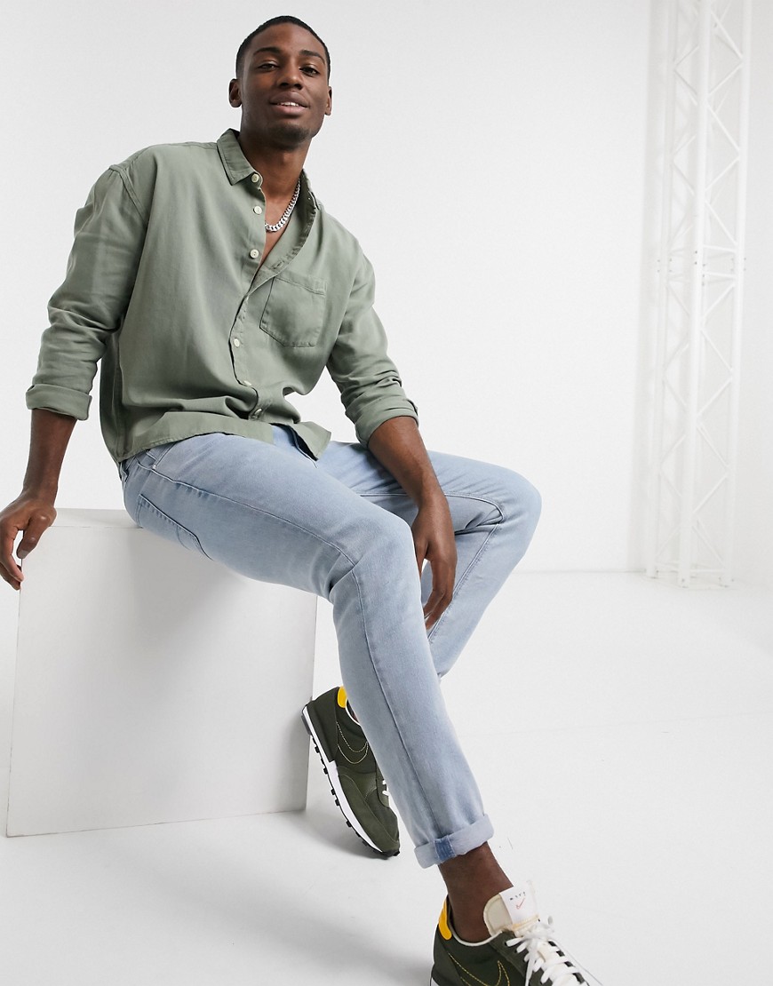 ASOS DESIGN – Khakifärgad jeansskjorta i ekologisk bomull i oversize 90-talsstil-Blå
