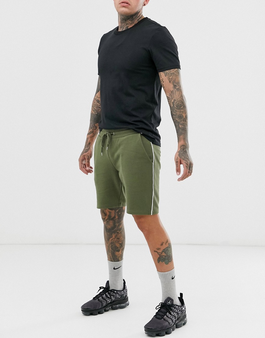 ASOS DESIGN – Khakifärgade jersey-shorts med extra smal passform och kantrand-Grön