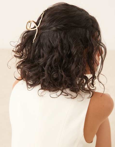 ASOS DESIGN hair claw with snake design in gold tone
