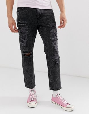 ASOS DESIGN - Klassieke stugge jeans in zwarte vintage wassing met extreme scheuren