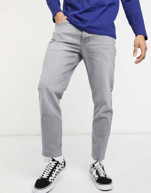 ASOS DESIGN – Klasyczne szare jeansy ze sztywnego materiału z surowym wykończeniem