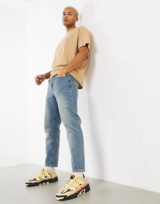 ASOS DESIGN – Klasyczne sztywne jeansy w spranym odcieniu brudno-niebieskim w stylu vintage